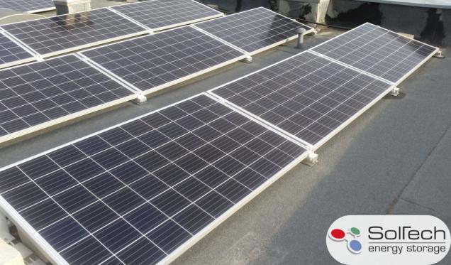 PV installation installed on a flat roof using SolTech Service's ballast-free mounting system. Photo used with permission of [https://soltech.com.pl/|SolTech Service].